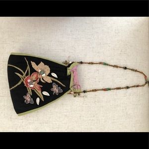 Embellished floral evening purse.